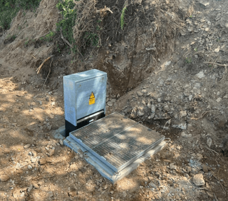 Completed EV charging installation with bollard protection